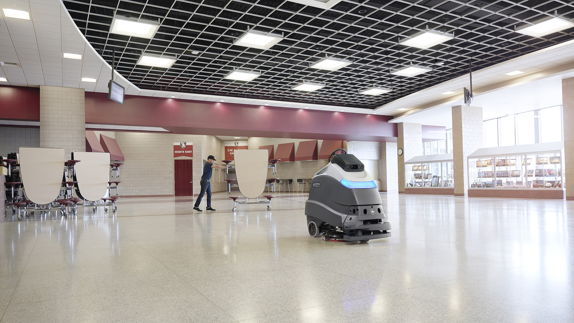 Autonomous Liberty SC50 Scrubber cleaning a school or university cafeteria