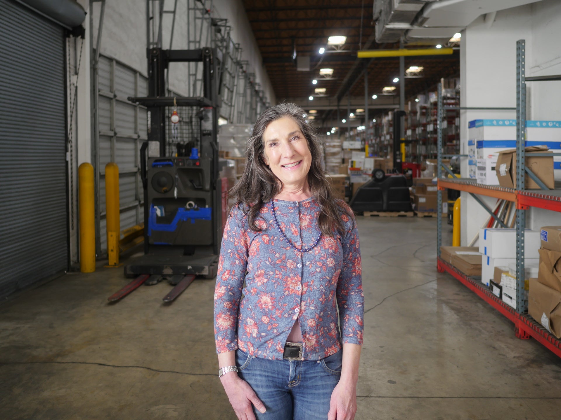 Mary Harper standing in the warehouse - WCP Employee Spotlight