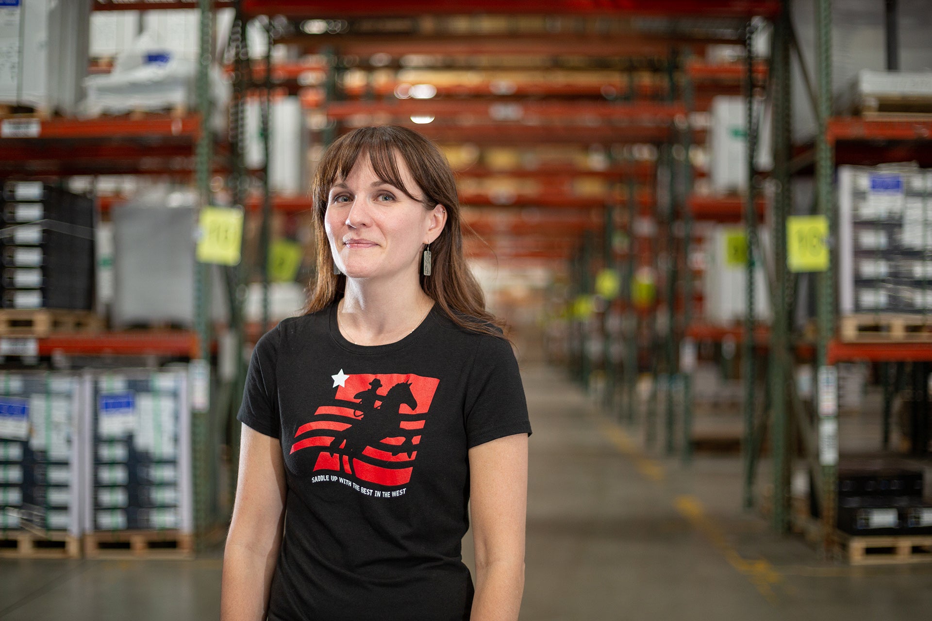 Jen Richards standing in the WCP Boise warehouse