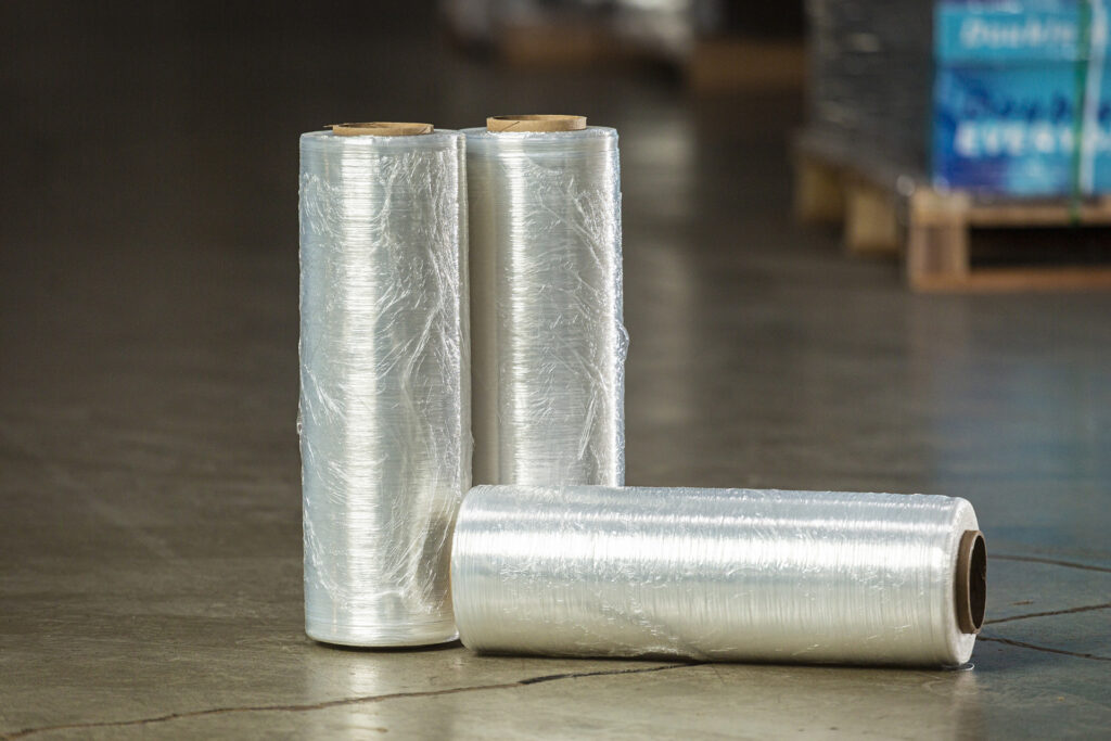 three rolls of stretch film on a wcp soltuiosn warehouse dock floor